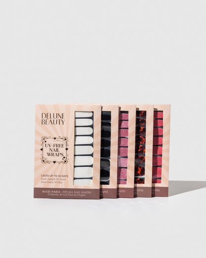 Tortoiseshell Noir (Non-UV Nail Wraps): row of Delune Beauty UV-free nail wrap packs standing upright
